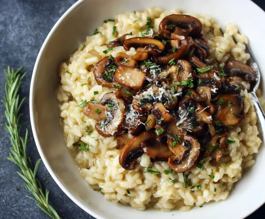 Creamy mushroom risotto served in a romantic setting for a dinner for two.