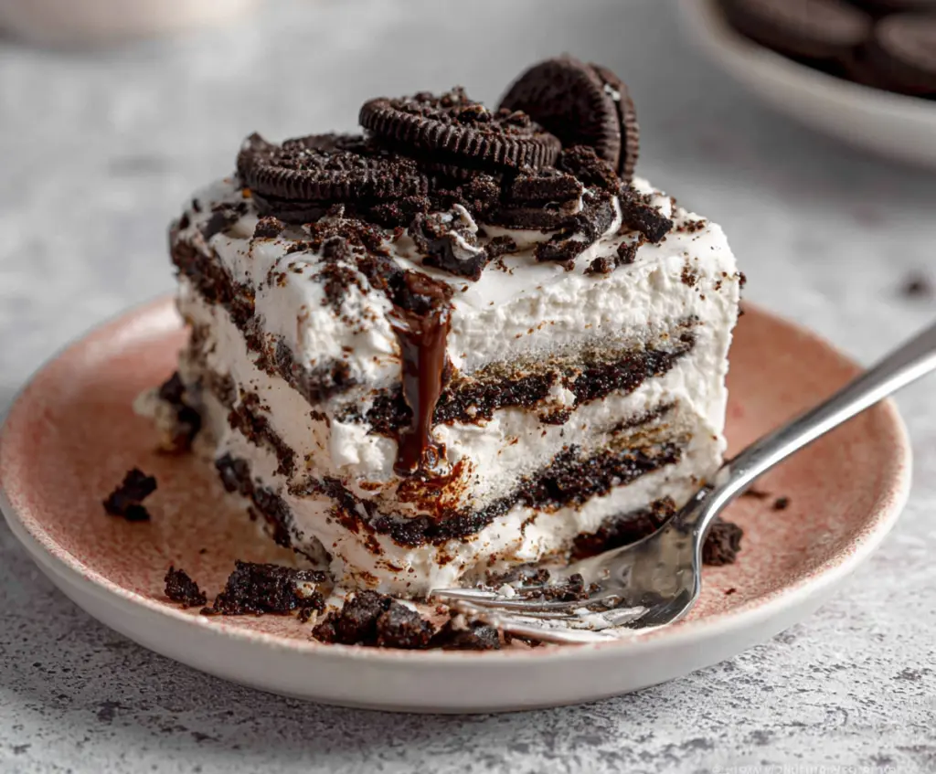 Delicious No Bake Oreo Icebox Cake with creamy layers and chocolate cookie crumbs